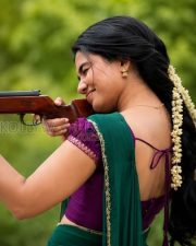 Charming Actress Mamitha Baiju in a Green Saree Photos 01