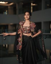 Enigmatic Actress Mamitha Baiju in a Black Embroidered Saree Photos 02