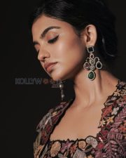 Enigmatic Actress Mamitha Baiju in a Black Embroidered Saree Photos 04
