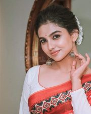 Glam Mamitha Baiju in a Red Bandhani Saree with White Blouse Pictures 02