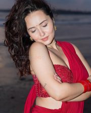 Glamorous Varsha Rekhate in a Red Saree with an Embellished Sleeveless Blouse Photos 01
