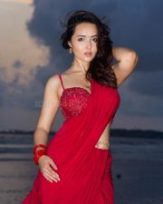 Glamorous Varsha Rekhate in a Red Saree with an Embellished Sleeveless Blouse Photos 02