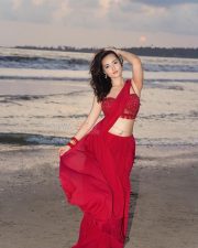 Glamorous Varsha Rekhate in a Red Saree with an Embellished Sleeveless Blouse Photos 07