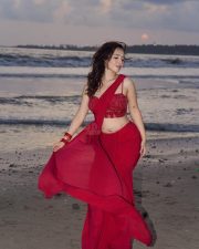 Glamorous Varsha Rekhate in a Red Saree with an Embellished Sleeveless Blouse Photos 09