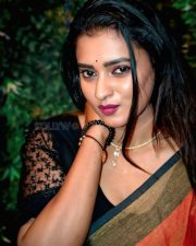 Actress Chaitra Ram in a Red Saree with a Black Blouse Photos 01