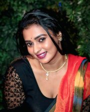 Actress Chaitra Ram in a Red Saree with a Black Blouse Photos 02