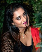 Actress Chaitra Ram in a Red Saree with a Black Blouse Photos 03