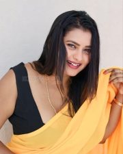 Kannada Beauty Chaitra Ram in a Yellow Saree and Black Sleeveless Blouse Pictures 04
