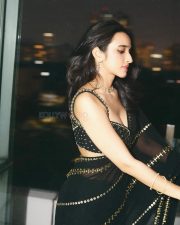 Sexy Nuveksha in a Black Saree with Delicate Golden Sequin Stripes and a Sleeveless Blouse Pictures 03 Sexy Nuveksha in a Black Saree with Delicate Golden Sequin Stripes and a Sleeveless Blouse Pictures 03