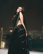 Sexy Nuveksha in a Black Saree with Delicate Golden Sequin Stripes and a Sleeveless Blouse Pictures 07 Sexy Nuveksha in a Black Saree with Delicate Golden Sequin Stripes and a Sleeveless Blouse Pictures 07
