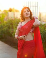 Actress Mrinmai Kolwalkar in a Plain Red Saree with a Sequined Sleeveless Blouse Pictures 01