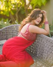 Actress Mrinmai Kolwalkar in a Plain Red Saree with a Sequined Sleeveless Blouse Pictures 06