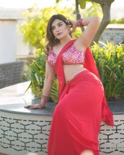Actress Mrinmai Kolwalkar in a Plain Red Saree with a Sequined Sleeveless Blouse Pictures 09