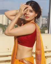 Alluring Beauty Aarti Chikara in a Yellow Saree with a Maroon Blouse Photos 02