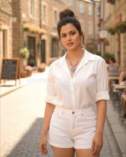 Casual Chic Beauty Anupma Agnihotri in a White Button Down Shirt and White Mini Denim Shorts Photos 01