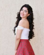 Hot Aarti Chhikara in a White Off Shoulder Lace Up Crop Top with a Red Green and White Mini Skirt Photos 04