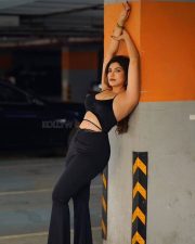 Paap Culture Actress Mrinmai Kolwalkar in a Black Two Piece Spaghetti Strap Crop Top and High Waisted Pants Photos 08