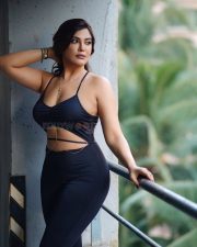 Paap Culture Actress Mrinmai Kolwalkar in a Black Two Piece Spaghetti Strap Crop Top and High Waisted Pants Photos 10
