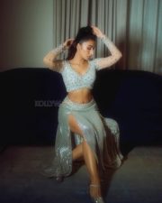 Sexy Dhanashree Verma in an Icy Light Blue Two Piece Sequin Outfit with a Long Sleeved Deep V Neck Crop Top with a Matching Thigh High Slit Pictures 08