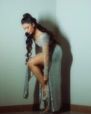 Sexy Dhanashree Verma in an Icy Light Blue Two Piece Sequin Outfit with a Long Sleeved Deep V Neck Crop Top with a Matching Thigh High Slit Pictures 09