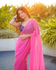 Sexy Nishi Saxena in a Hot Pink Saree with a Royal Blue Sleeveless Embroidered Blouse Photos 03