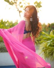 Sexy Nishi Saxena in a Hot Pink Saree with a Royal Blue Sleeveless Embroidered Blouse Photos 04