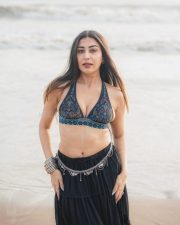Sexy Ruma Sharma in a Bohemian Style Halter Neck Top with a Black Tiered Skirt Photos 02