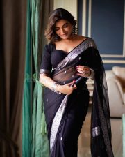 Sophisticated Actress Mrinmai Kolwalkar in a Navy Embroidered Saree Photos 01