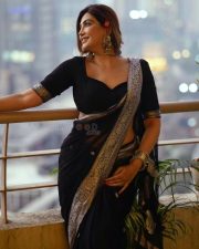 Sophisticated Actress Mrinmai Kolwalkar in a Navy Embroidered Saree Photos 05