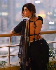 Sophisticated Actress Mrinmai Kolwalkar in a Navy Embroidered Saree Photos 06