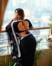 Sophisticated Actress Mrinmai Kolwalkar in a Navy Embroidered Saree Photos 07