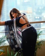 Sophisticated Actress Mrinmai Kolwalkar in a Navy Embroidered Saree Photos 08