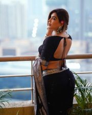 Sophisticated Actress Mrinmai Kolwalkar in a Navy Embroidered Saree Photos 10
