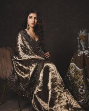 Attractive Sara Arjun in a Bronze Toned Velvet Saree with a Black Velvet Blouse Pictures 04