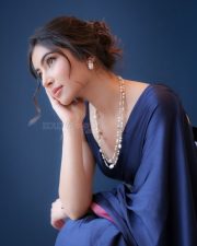 Dhurandhar The Revenge Actress Sara Arjun in a Navy Blue Satin Saree with a Pink Border and Sleeveless V Neck Blouse Photos 05