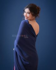 Dhurandhar The Revenge Actress Sara Arjun in a Navy Blue Satin Saree with a Pink Border and Sleeveless V Neck Blouse Photos 09