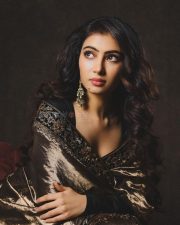 The Perfect Girl Sara Arjun in a Black and Gold Liquid Silk Saree with a Full Sleeved Blouse Pictures 02