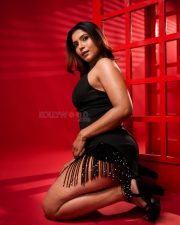 Bold and Glamorous Tanya Chaudhari in a Black Sleeveless Bodycon Mini Dress Photos 04