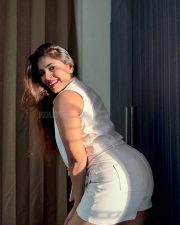 Seductive Tanya Chaudhari Cleavage in a White Lace Bra and Mini Skirt Photos 09