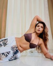 Sensuous Tanya Chaudhari in a Dark Brown Halter Straps Bikini Top with Cleavage Neckline and Long Flowy Off White Printed Maxi Skirt Pictures 02 Sensuous Tanya Chaudhari in a Dark Brown Halter Straps Bikini Top with Cleavage Neckline and Long Flowy Off White Printed Maxi Skirt Pictures 02