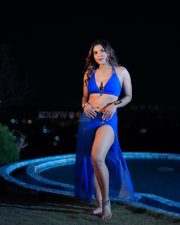 Stunning Tanya Chaudhari in a Two Piece Bright Blue Bikini Halter Neck Top with a Deep Cleavage and High Cut Bikini Bottom and a Sarong Photos 03