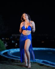 Stunning Tanya Chaudhari in a Two Piece Bright Blue Bikini Halter Neck Top with a Deep Cleavage and High Cut Bikini Bottom and a Sarong Photos 04