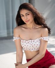 Charming Actress Heer Achhra in a White Floral Crop Top Red Shorts Photos 01