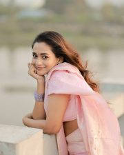 Graceful Actress Kaavya Arivumani in a Pink Shawl Drape Photos 03