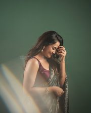 Mysterious Actress Kaavya Arivumani in a Dark Grey Printed Saree Photos 01
