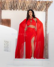 Passionate Actress Vishnu Priya Bhimeneni in a Red Halter Crop Top and Slit Skirt Photos 04