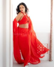 Passionate Actress Vishnu Priya Bhimeneni in a Red Halter Crop Top and Slit Skirt Photos 07