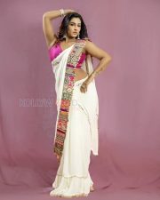 Resplendent Vishnu Priya Bhimeneni Cleavage in a White Embroidered Saree and Hot Pink Deep V Neck Blouse Photos 04