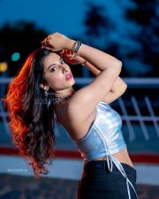 Sexy Actress Vishnu Priya Bhimeneni in a Silver Metallic Halter Chain Top with a Dark Denim Jeans Photos 01