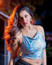 Sexy Actress Vishnu Priya Bhimeneni in a Silver Metallic Halter Chain Top with a Dark Denim Jeans Photos 02